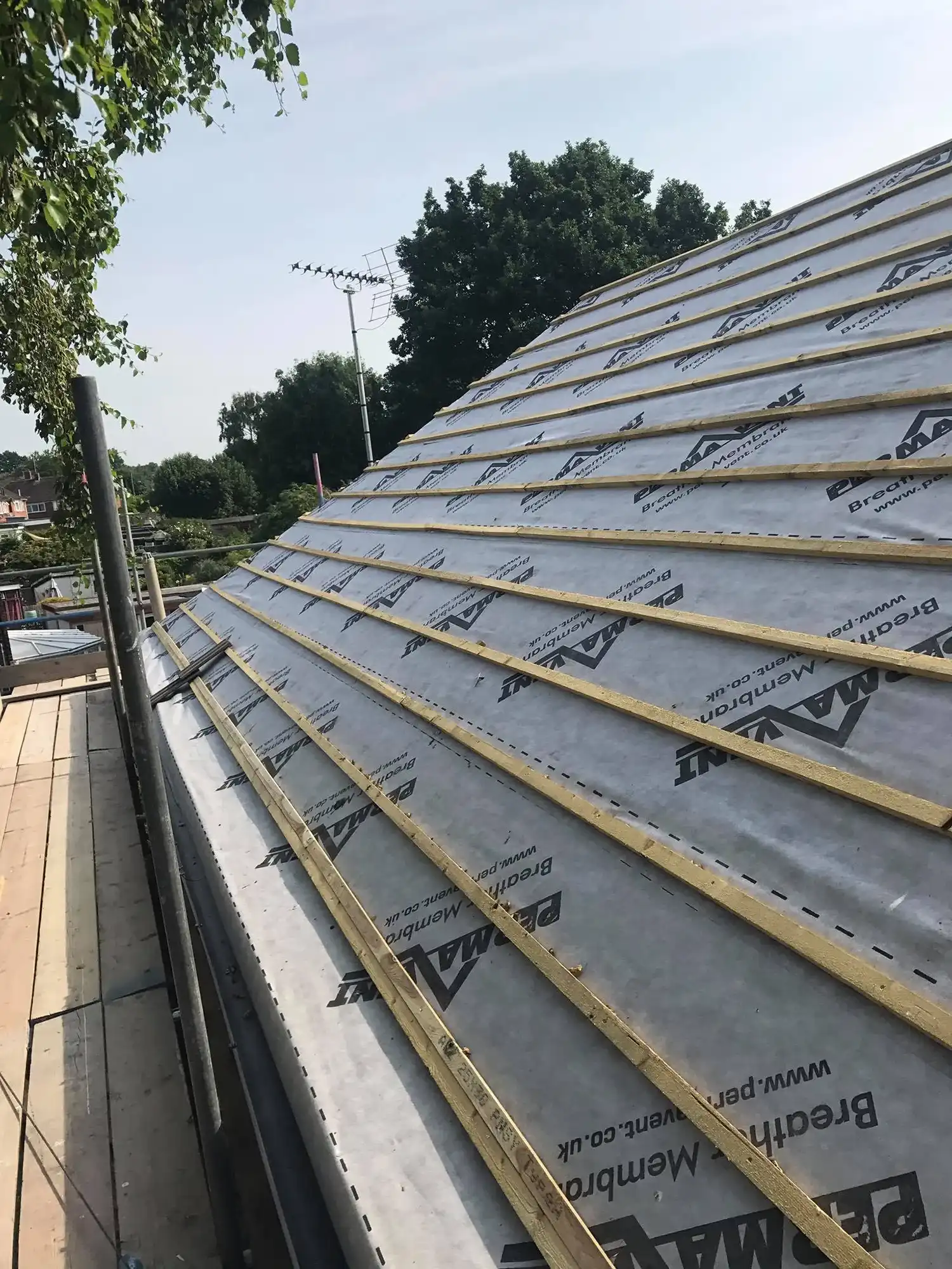 Roof insulation and breathable membrane installation